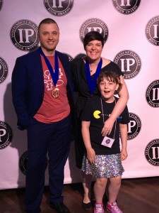 Photographer Octavian Ciubotariu, Author Amy Leask and Vocal Talent Ruby Zimmer at the 2018 IPPY Awards